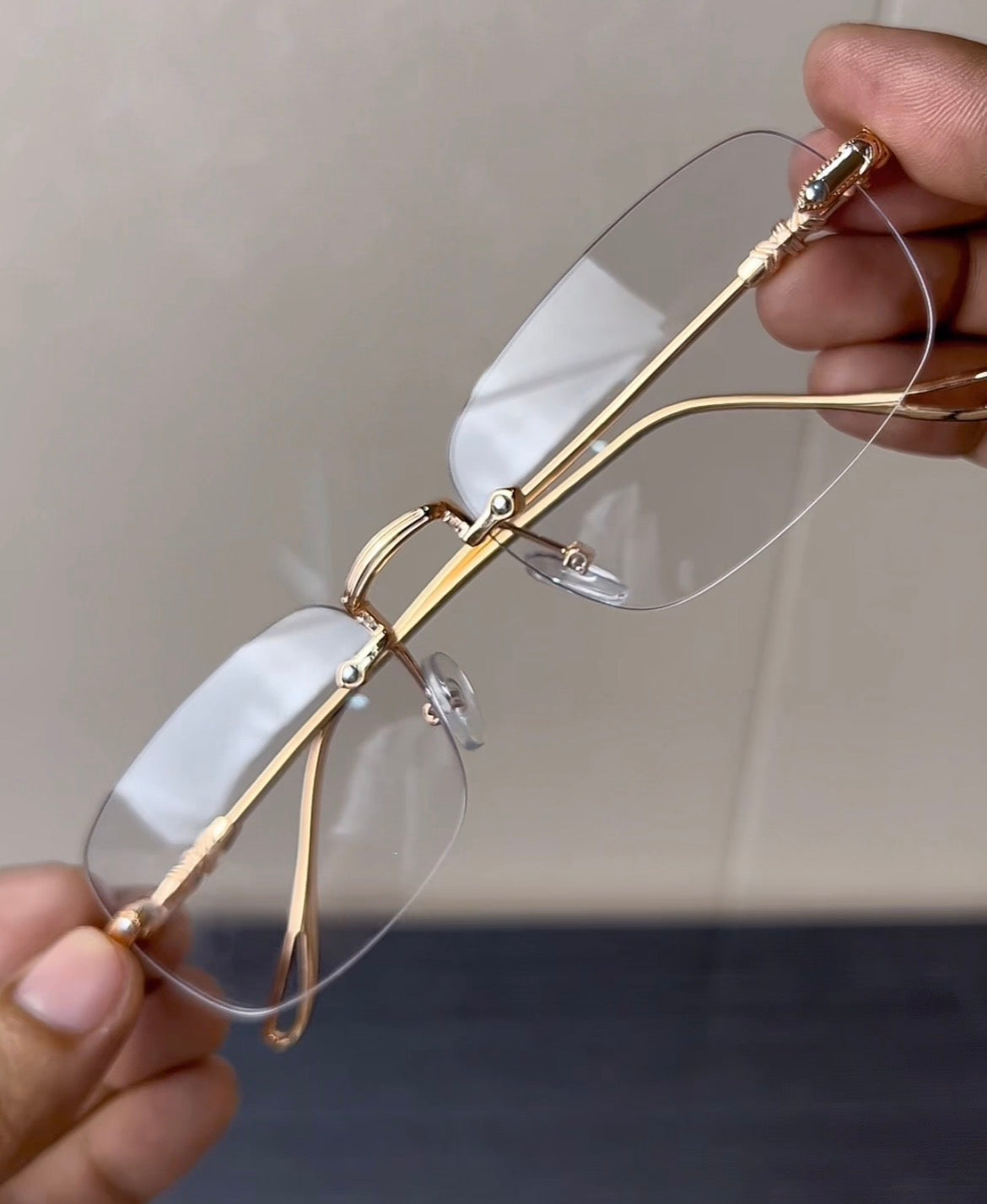 Elegant Rimless Gold Eyeglasses with Minimalist Design