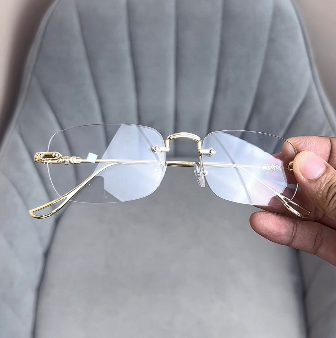Elegant Rimless Gold Eyeglasses with Minimalist Design